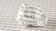 Rypistetty paperi jossa sana True