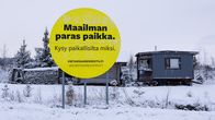 En gul skylt med texten Världens bästa plats.
