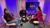 Three people in a podcast studio. 