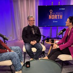 Three people in a podcast studio. 