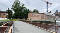 Tammerkosken väliaikainen puurakenteinen silta koskimaisemassa. 