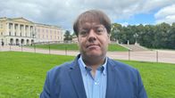 Trond Norén Isaksen framför det kungliga slottet i Oslo.