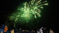 People enjoy New Year's Eve fireworks in Tampere.
