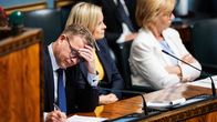 Orpo, Purra and Henriksson in the ministerial seats at parliament. 