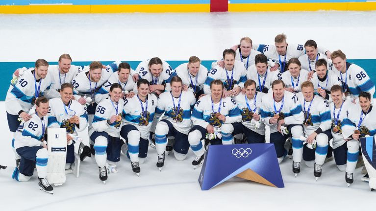 Leijonien pelaajat joukkuekuvassa.