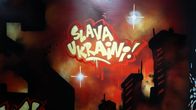 Maalauksessa lukee "Slava Ukraini!"