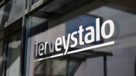 Terveystalon logo rakennuksen julkaisivussa.