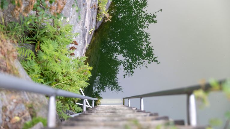 Steep ladder leading into Kempele swimming hole.