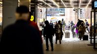 People at a metro station, no identifiable faces.