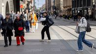 People crossing Aleksanterinkatu in Helsinki.