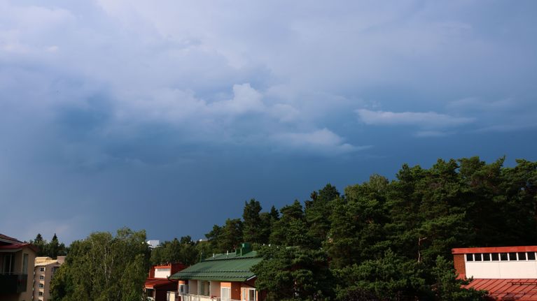 Dark clouds over a suburban residential area. 