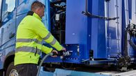 Filling a fuel cell electric vehicle with hydrogen.