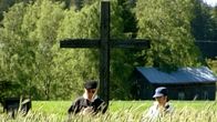 Pyhän Henrikin muistoristi Repolassa.