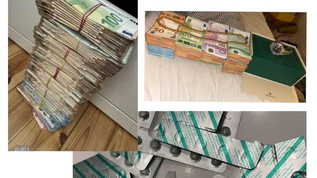 Poliisin takavarikoimaa aineistoa kuten rahaa. pillereitä ja kello.