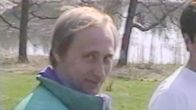 Huonolaatuinen kuva Vladimir Putinista ja toisesta mieshenkilöstä.