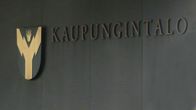 Vaakuna Rovaniemen kaupungintalon seinässä