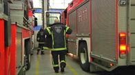 Palomiehiä ja paloautoja