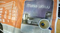 Lemminkäinen mainostaa sanomalehdessa Matkakeskusta.