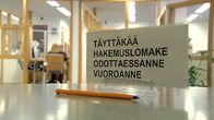 Kynä KELAn toimiston tiskillä