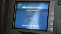 Pankkiautomaatin näyttöruutu.