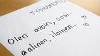 Kuvassa on käsin kirjoitettu työhakemus.