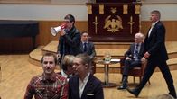 Mielenosoittajat keskeyttivät Jyrki Kataisen ja Herman van Rompoyn keskustelutilaisuuden Yliopiston juhlasalissa 7.5.2013.