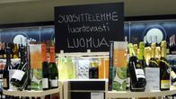Luomua mainostetaan Alkossa.
