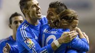 Gareth Bale, Cristiano Ronaldo ja Luka Modric juhlivat 1-0-johtomaalin jälkeen.