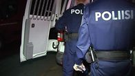 Poliiseja työssään.