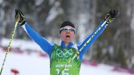 Sami Jauhojärvi tuulettaa olympiavoittajana.