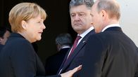 Venäjän presidentti Vladimir Putin tapasi pikaisesti Ukrainan vastavalitun presidentin Petro Porošenkon Normandian maihinnousun 70-vuotismuistojuhlien kulisseissa. Vasemmalla Saksan liittokansleri Angela Merkel.