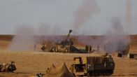 Israelin armeijan panssarivaunuja lähellä Gazan kaistan rajaa sunnuntaina 13. heinäkuuta
