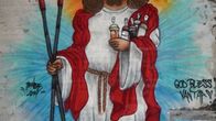 Jeesus-graffiti jo osittain puretun Kaivokselan kirkon alttariseinässä. 