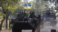 Ukrainalaisjoukot partioivat Donetskin alueella lauantaina 20. syyskuuta 2014. 