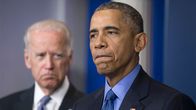 Barack Obama ja taustalla varapresidentti Joe Biden