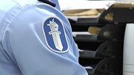 Poliisin hihamerkki.