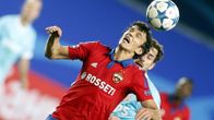 Davy Propper (R) of PSV Eindhoven in action against Roman Eremenko (L) of CSKA Moscow during the UEFA Champions League