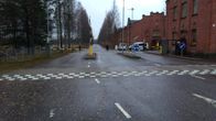 Poliiseja Hennalan hätämajoitusyksikössä.