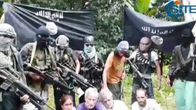 Abu Sayyaf uhkaa panttivankejaan julkaisemallaan videolla.