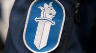 Poliisin hihamerkki.