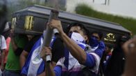 epa06893776 Friends and relatives of Gerald Vasquez attend his funeral, in Managua, Nicaragua, 16 July 2018. Vazquez died on 16 July during an attack on the National Autonomous University of Nicaragua (UNAN) allegedly by pro government militia. EPA-EFE/Rodrigo Sura