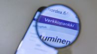 Nordean verkkopankin aloitusruutua tarkastellaan suurennuslasin läpi.