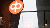 OP-ryhmän logo seinässä.