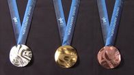 Vancouverin olympiakisojen mitalit.
