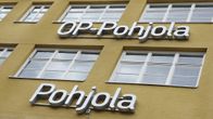 OP-Pohjolan ja Pohjolan logot talon seinässä.