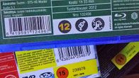 Ikärajamerkintöjä elokuvien dvd-kansissa.