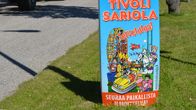 Tivolin pylväskyltti kadulla.