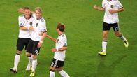 Saksan Bastian Schweinsteiger Andre Schürrle, Mario Götze ja Thomas Müller juhlivat.