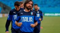 Italian Andrea Pirlo juoksee harjoituskentällä.