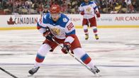 Venäjän Jevgeni Kuznetsov kiekossa